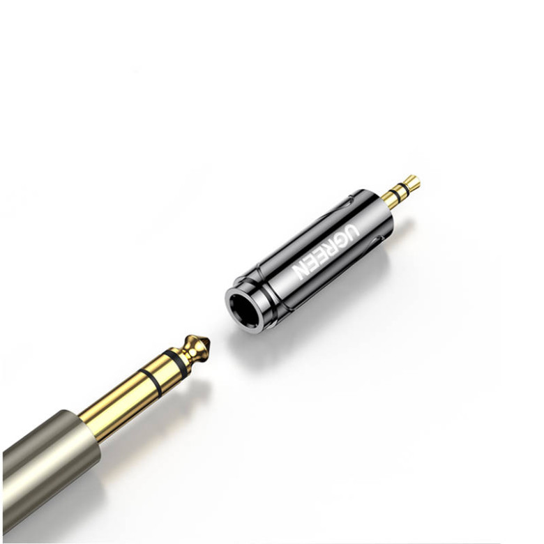 UGREEN 3,5 mm-es jack 6,5 / 6,35 mm-es mini jack adapter (szürke) UGREEN 3,5 mm-es jack 6,5 / 6,35 mm-es mini jack adapter (szürke)
